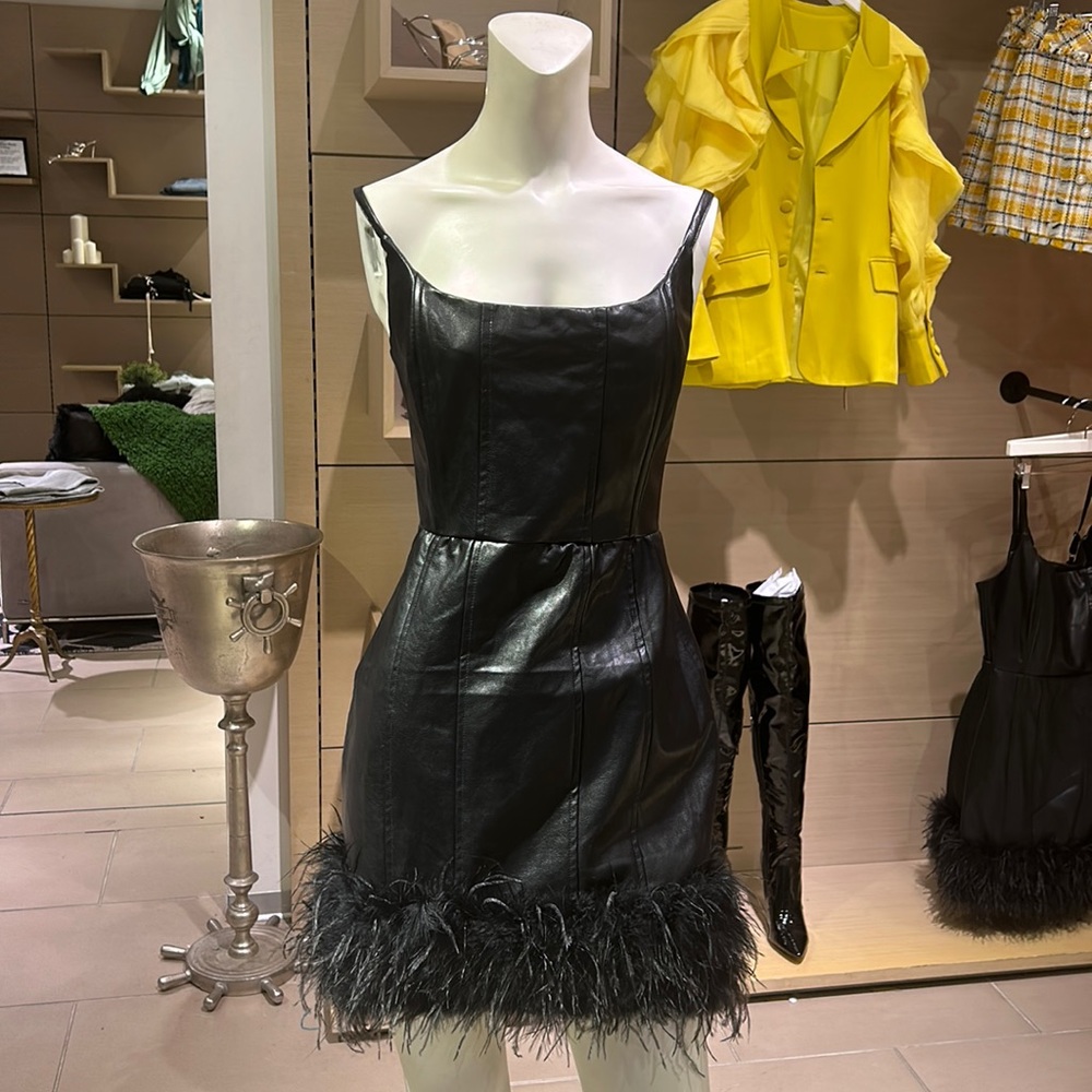 Vegan leather dress with feather trim